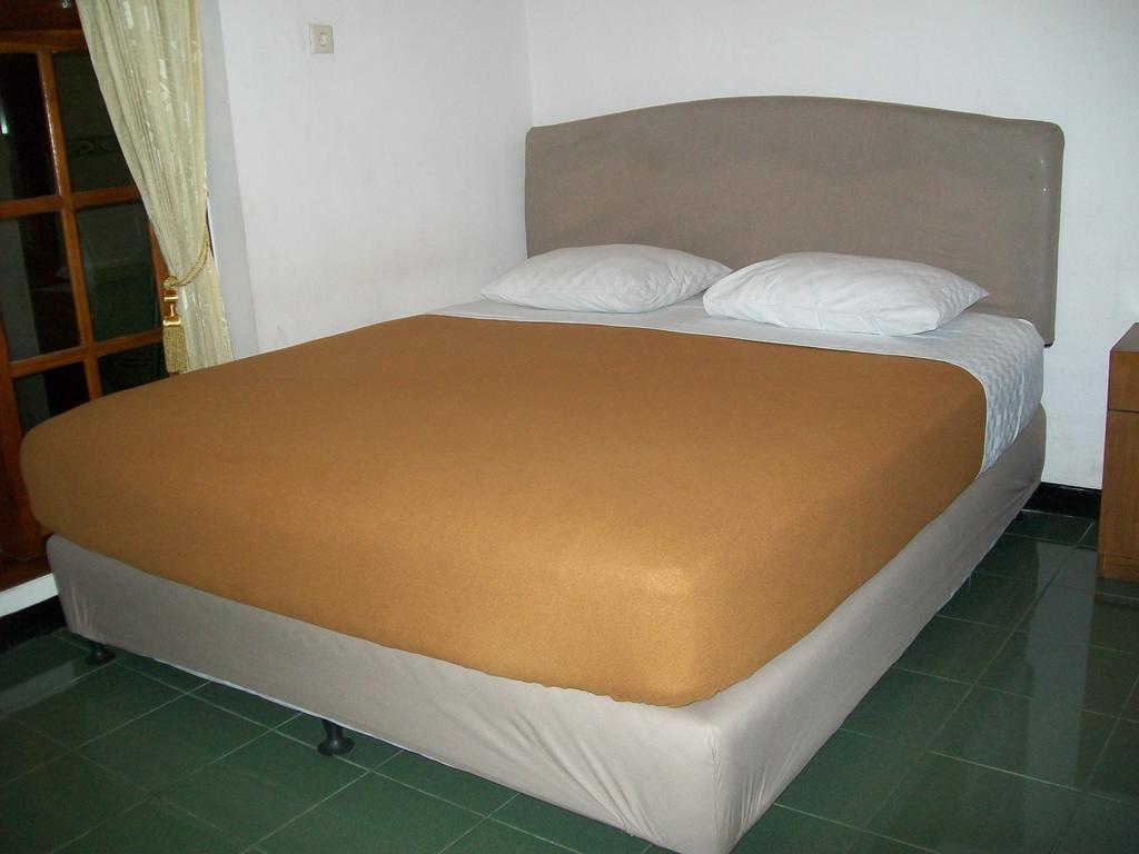 Krowi Inn Surabaya Zimmer foto